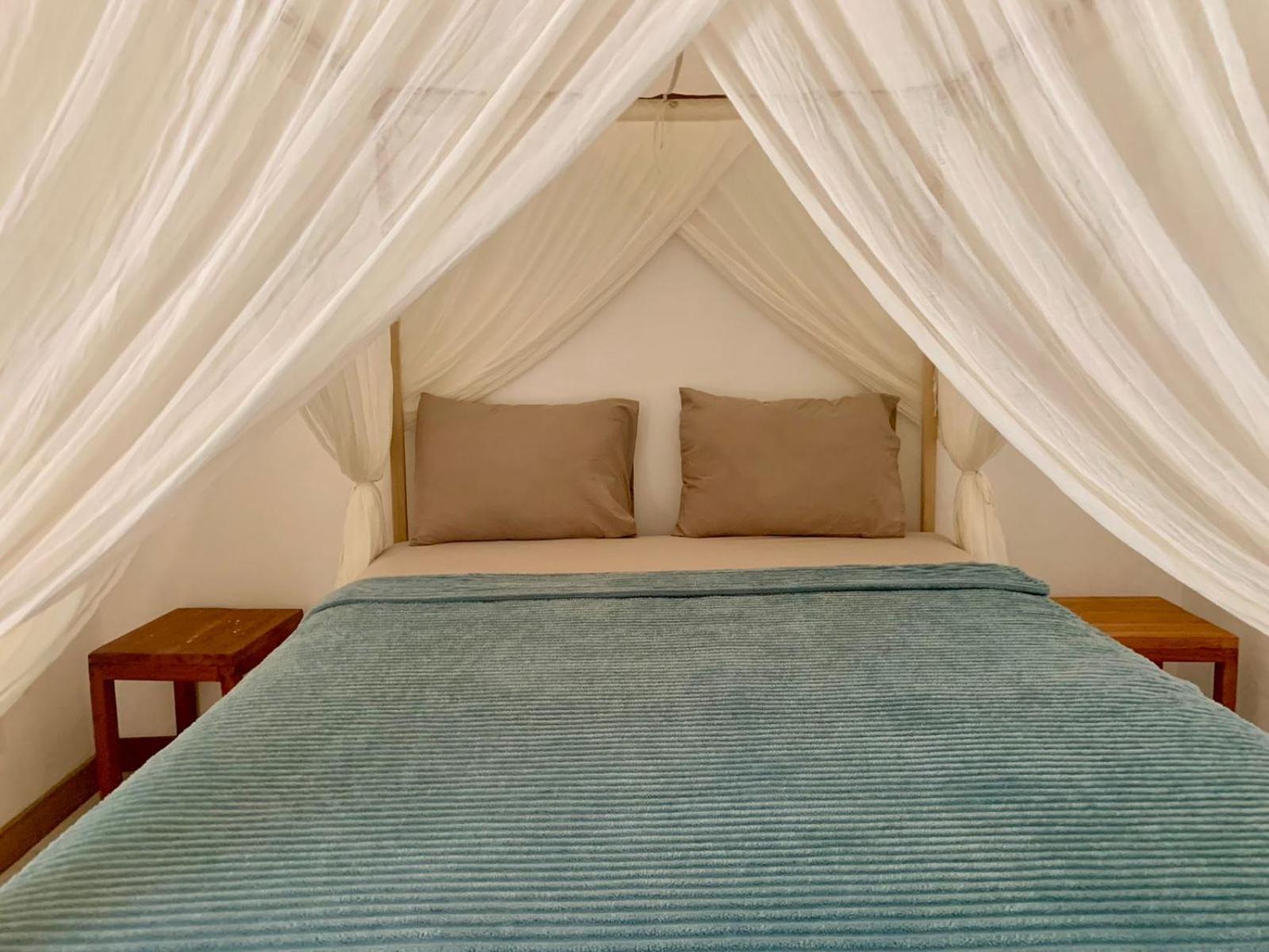 The Village Rua Beach Homestay Eksteriør billede